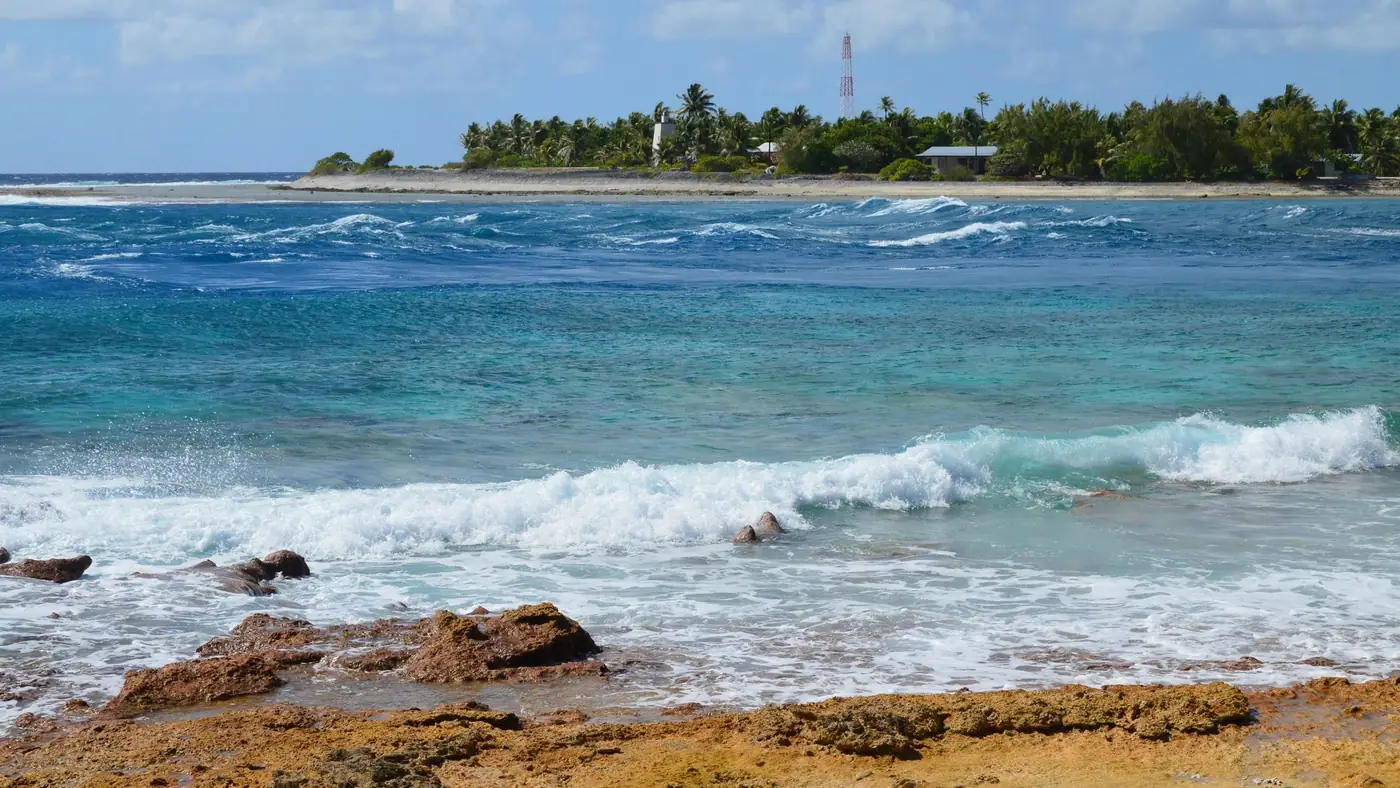 Waves breaking on the rocky shore of Nauru